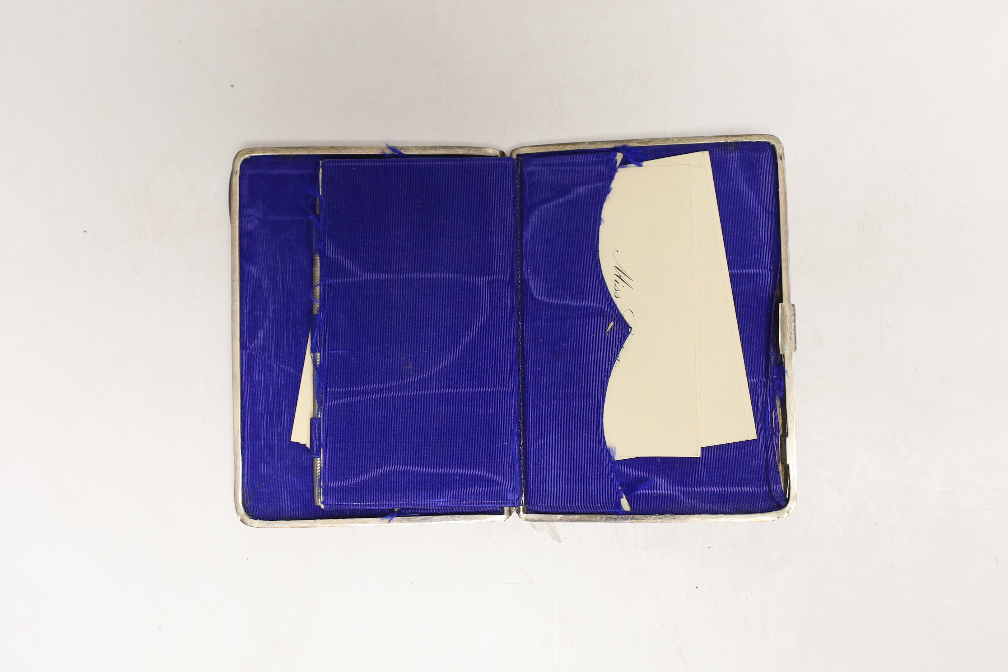 A late Victorian silver rectangular card/aide memoir purse, George Unite, Birmingham, 1885, 10cm, in fitted case.